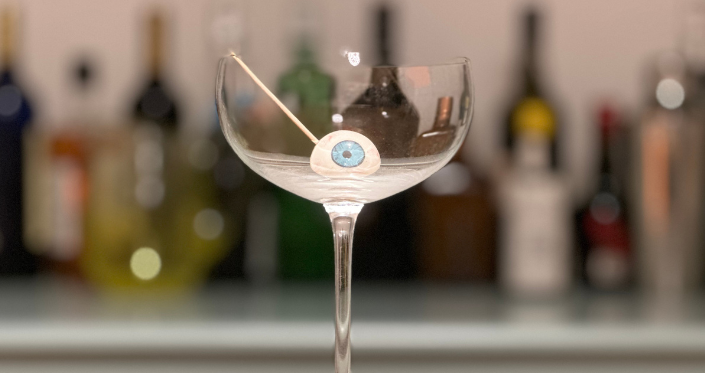 A cocktail glass with a glass eyeball